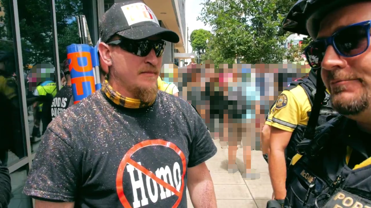 Allen Pucket begs the police to escort him to safety after harassing PDX Pride