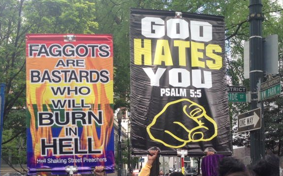 Homophobic signs carried by Allen Pucket and his followers with Joey Gibson at the Portland Pride parade