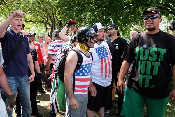 Jacob Ott rallies with Joey Gibson and members of the Patriot Prayer organization on August 6th.