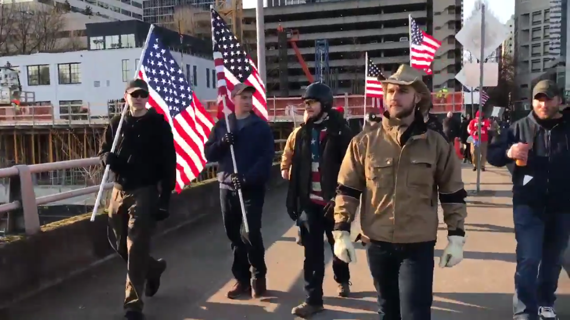 Aaron Williamson attends an anti-immigrant hate rally