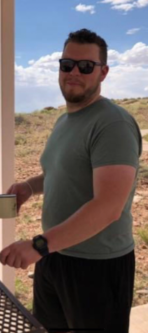 picture of Erick drinking a cup of coffee on a porch