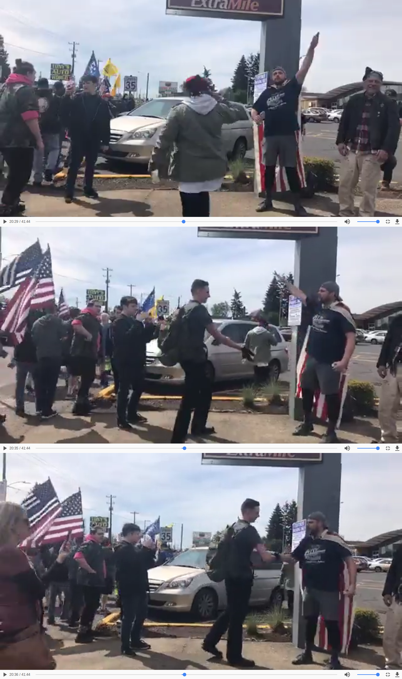 Jacob Ott approaches Jeremy Christian to shake hands as Jeremy Christian throws nazi salutes.