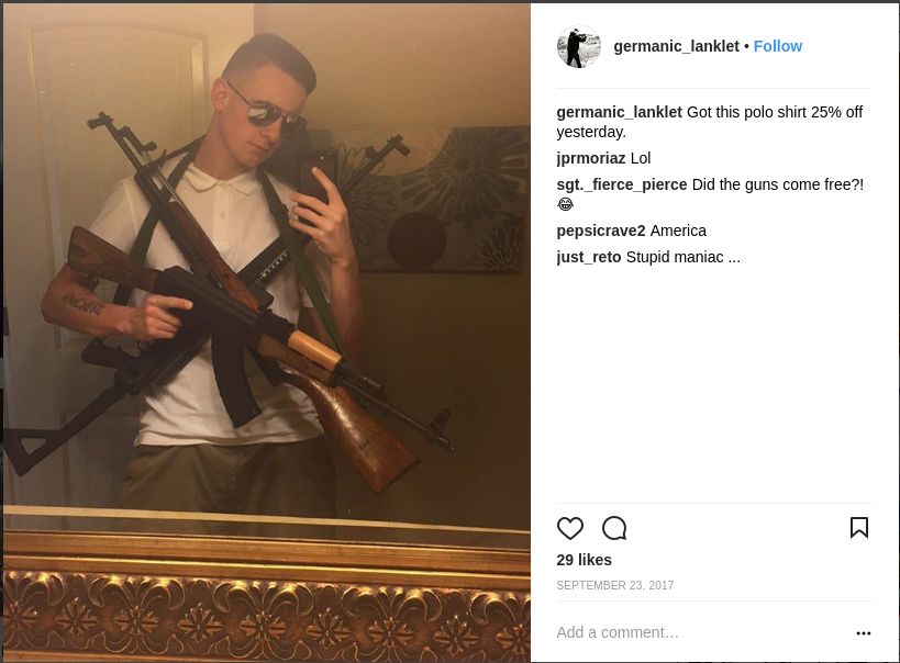 Jake Von Ott poses with rifles in his mother's bathroom