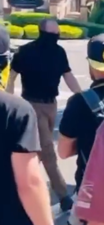 Another picture of Michael Dorsey after being partially unmasked in Oregon City after a brawl with Proud Boys during Oregon City's Pride celebration.