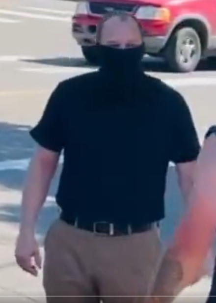 Picture of Michael Dorsey after getting partially unmasked by Proud Boys on June 24 during the Oregon City Pride celebration.