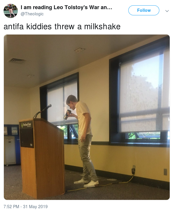 Mahoney sniffs a freshly-emptied milkshake cup