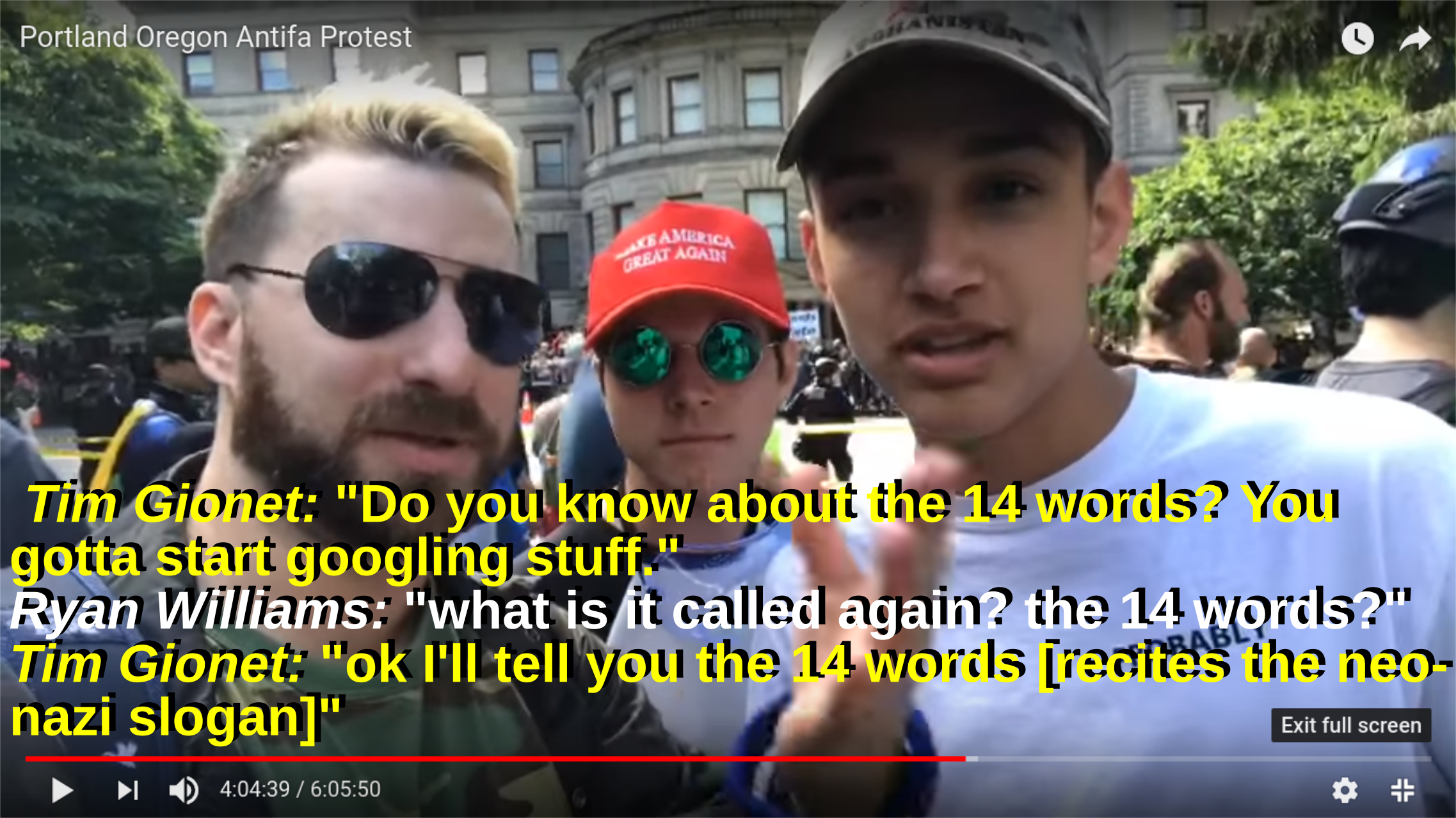 a racist teaches nazi slogans to a young person at a patriot prayer rally