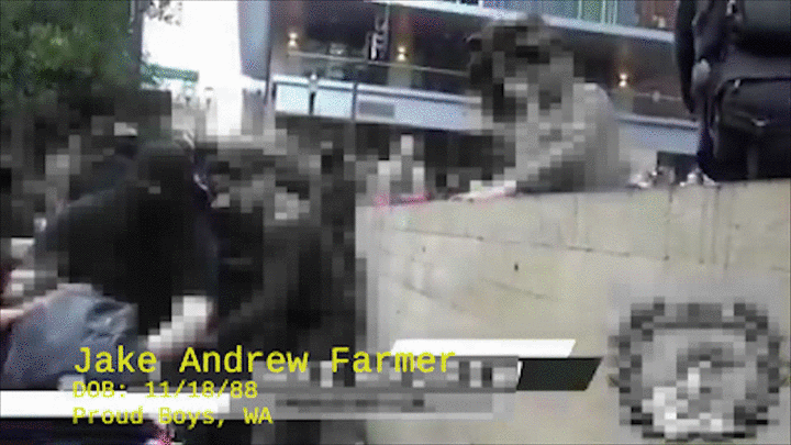 Jake Farmer slamming an anti-fascist activist's head into a concrete wall